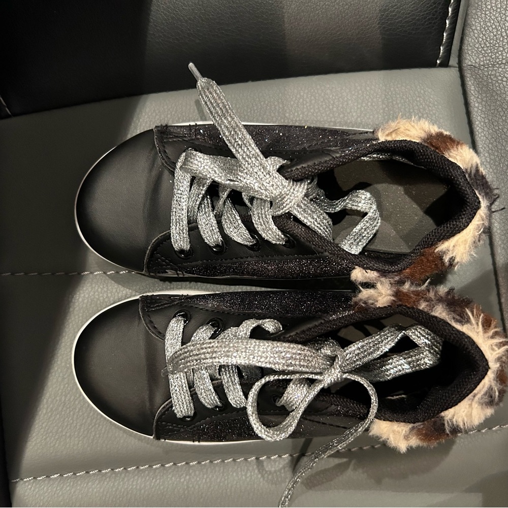 Kids Black Low-Top Sneakers with Metallic Silver Laces and fur